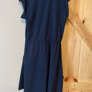 Navy blue sundress, lightweight material, knee length